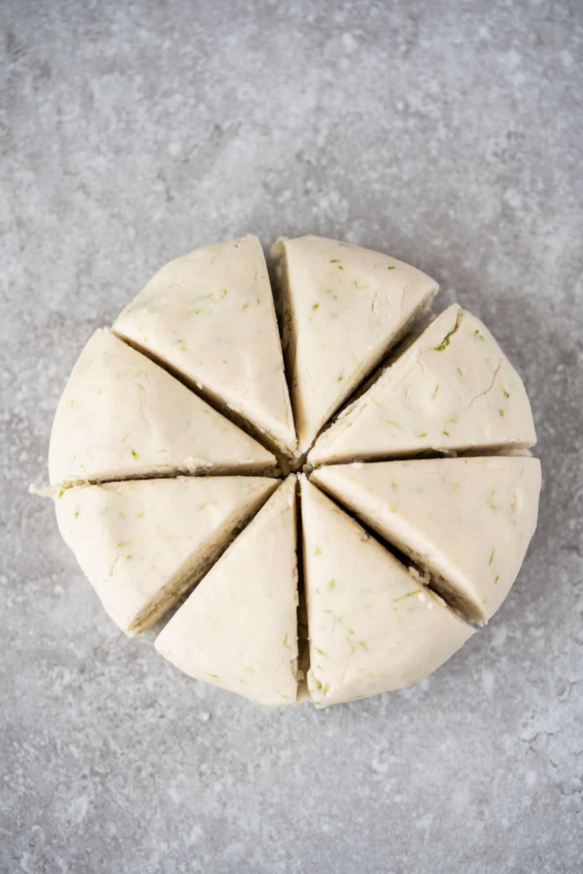cassava flour tortilla dough cut into 8 equal triangles