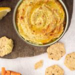 baked zucchini butterbean hummus overhead with crackers