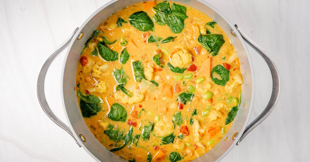 Coconut chickpea curry in large soup pot.