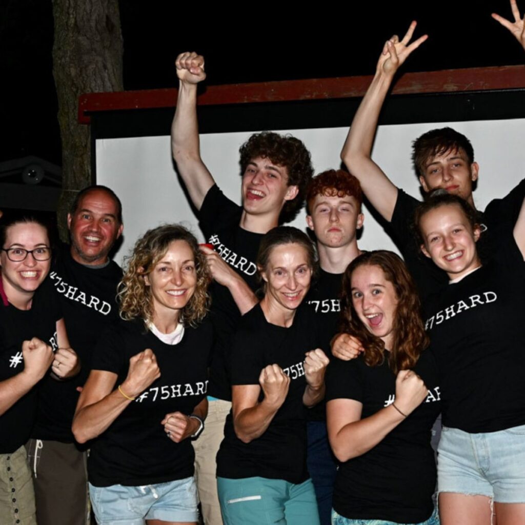 My family celebrating completing 75-hard all wearing 75-hard t-shirts.